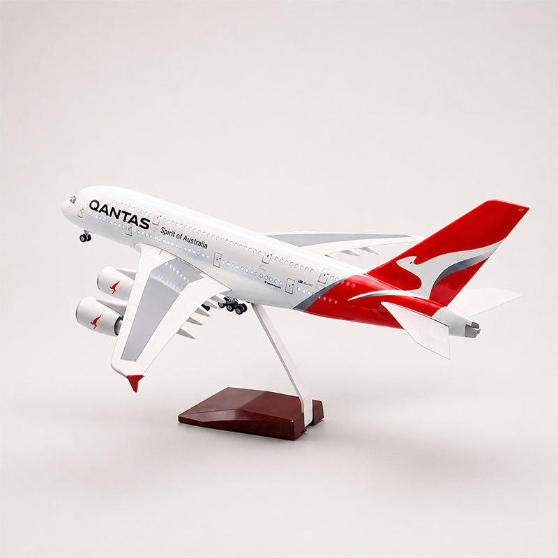 Bottom view of Qantas Airbus A380 1:160 scale aircraft model showing detailed wings engines landing gear and resin craftsmanship.
