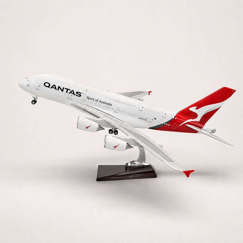 Qantas Airbus A380 1:160 scale LED airplane model handcrafted resin aircraft displayed on premium wooden stand front left view.