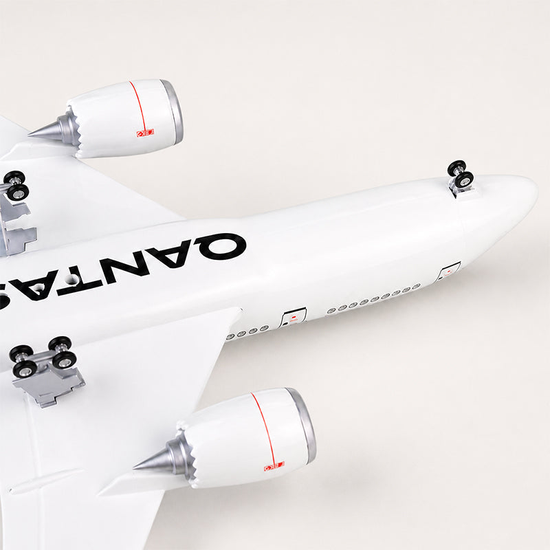 Close-up of Qantas Airbus A380 1:160 scale model aircraft underside featuring detailed engines landing gear and premium resin finish.